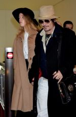 AMBER HEARD and Johnny Depp Arrives at Tokyo International Airport