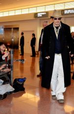 AMBER HEARD and Johnny Depp Arrives at Tokyo International Airport