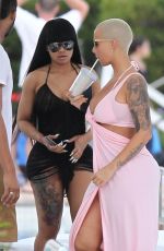 AMBER ROSE and BLAC CHYNA at a Pool in Miami