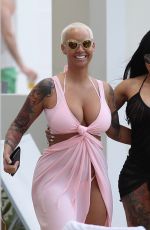 AMBER ROSE and BLAC CHYNA at a Pool in Miami