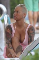 AMBER ROSE and BLAC CHYNA at a Pool in Miami