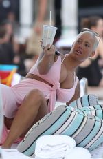 AMBER ROSE and BLAC CHYNA at a Pool in Miami
