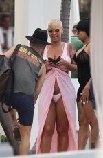 AMBER ROSE and BLAC CHYNA at a Pool in Miami