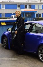 ANJA RUBIK Arrives at a Photo Studio in Warsaw
