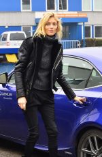 ANJA RUBIK Arrives at a Photo Studio in Warsaw