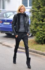 ANJA RUBIK Arrives at a Photo Studio in Warsaw