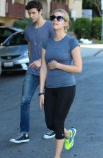 ASHLEY BENSON in Tights Leaves a Gym in Los Angeles