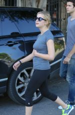 ASHLEY BENSON in Tights Leaves a Gym in Los Angeles