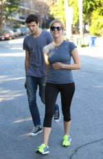 ASHLEY BENSON in Tights Leaves a Gym in Los Angeles