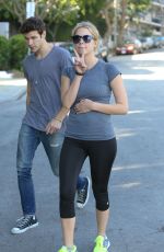 ASHLEY BENSON in Tights Leaves a Gym in Los Angeles