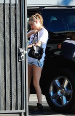 CARA DEKEVINGNE in Shorts Out and About in Los Angeles 2701
