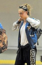 CARA DELEVINGNE Arrives at Los Angeles International Airport 0201