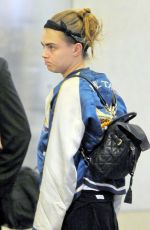 CARA DELEVINGNE Arrives at Los Angeles International Airport 0201