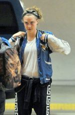 CARA DELEVINGNE Arrives at Los Angeles International Airport 0201