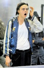 CARA DELEVINGNE Arrives at Los Angeles International Airport 0201