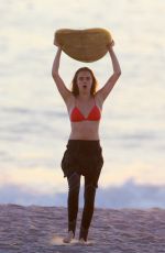 CARA DELEVINGNE in Bikini Top at a Beach in Malibu