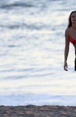 CARA DELEVINGNE in Bikini Top at a Beach in Malibu