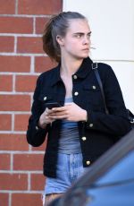 CARA DELEVINGNE in Shorts Out and About in Los Angeles