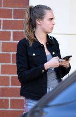 CARA DELEVINGNE in Shorts Out and About in Los Angeles