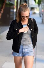 CARA DELEVINGNE in Shorts Out and About in Los Angeles