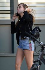 CARA DELEVINGNE in Shorts Out and About in Los Angeles