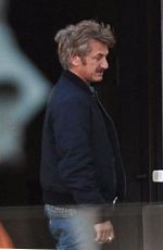 CHARLIZE THERON and Sean Penn at a Cigarette Break
