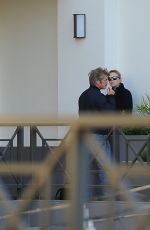 CHARLIZE THERON and Sean Penn at a Cigarette Break