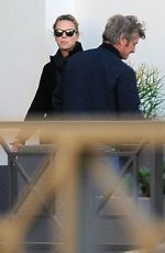 CHARLIZE THERON and Sean Penn at a Cigarette Break