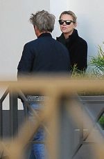 CHARLIZE THERON and Sean Penn at a Cigarette Break