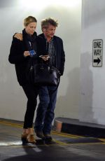 CHARLIZE THERON and Sean Penn at a Cigarette Break