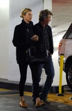 CHARLIZE THERON and Sean Penn at a Cigarette Break