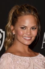 CHRISSY TEIGEN at Instyle and Warner Bros Golden Globes Party in Beverly Hills