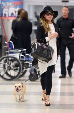 CHRISSY TEIGEN at JFK Aiport in New York 0401