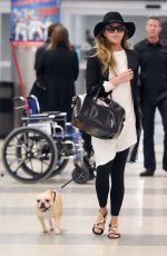 CHRISSY TEIGEN at JFK Aiport in New York 0401