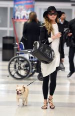 CHRISSY TEIGEN at JFK Aiport in New York 0401