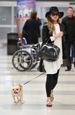 CHRISSY TEIGEN at JFK Aiport in New York 0401