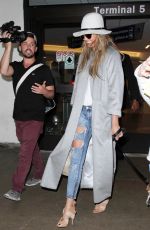CHRISYY TEIGEN at Los Angeles International Airport