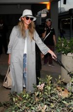 CHRISYY TEIGEN at Los Angeles International Airport