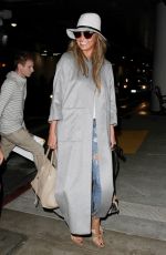 CHRISYY TEIGEN at Los Angeles International Airport