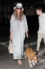 CHRISYY TEIGEN at Los Angeles International Airport