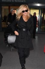 ELLIE GOULDIN at Heathrow Airport in London