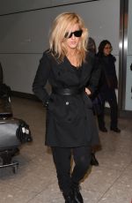 ELLIE GOULDIN at Heathrow Airport in London