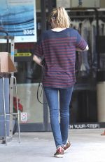 EMMA ROBERTS Getting Her Dry Cleaning in West Hollywood