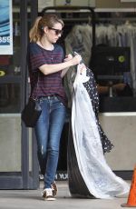 EMMA ROBERTS Getting Her Dry Cleaning in West Hollywood