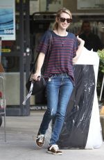 EMMA ROBERTS Getting Her Dry Cleaning in West Hollywood