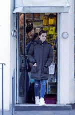 EMMA WATSON Leaves a Coffee Shop in London