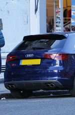 EMMA WATSON Leaves a Coffee Shop in London