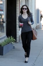 EMMY ROSSUM and a Friend at a Cafe in Venice