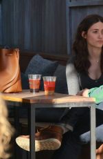 EMMY ROSSUM and a Friend at a Cafe in Venice