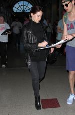 FELICITY JONES Arrives at Los Angeles International Airport 0701